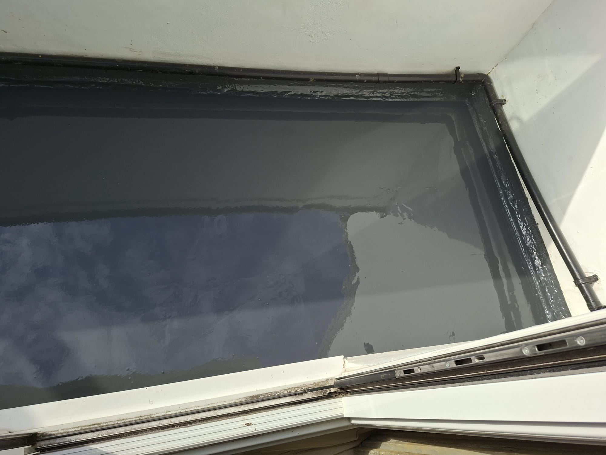 Flat roof balcony with professional waterproof membrane applied