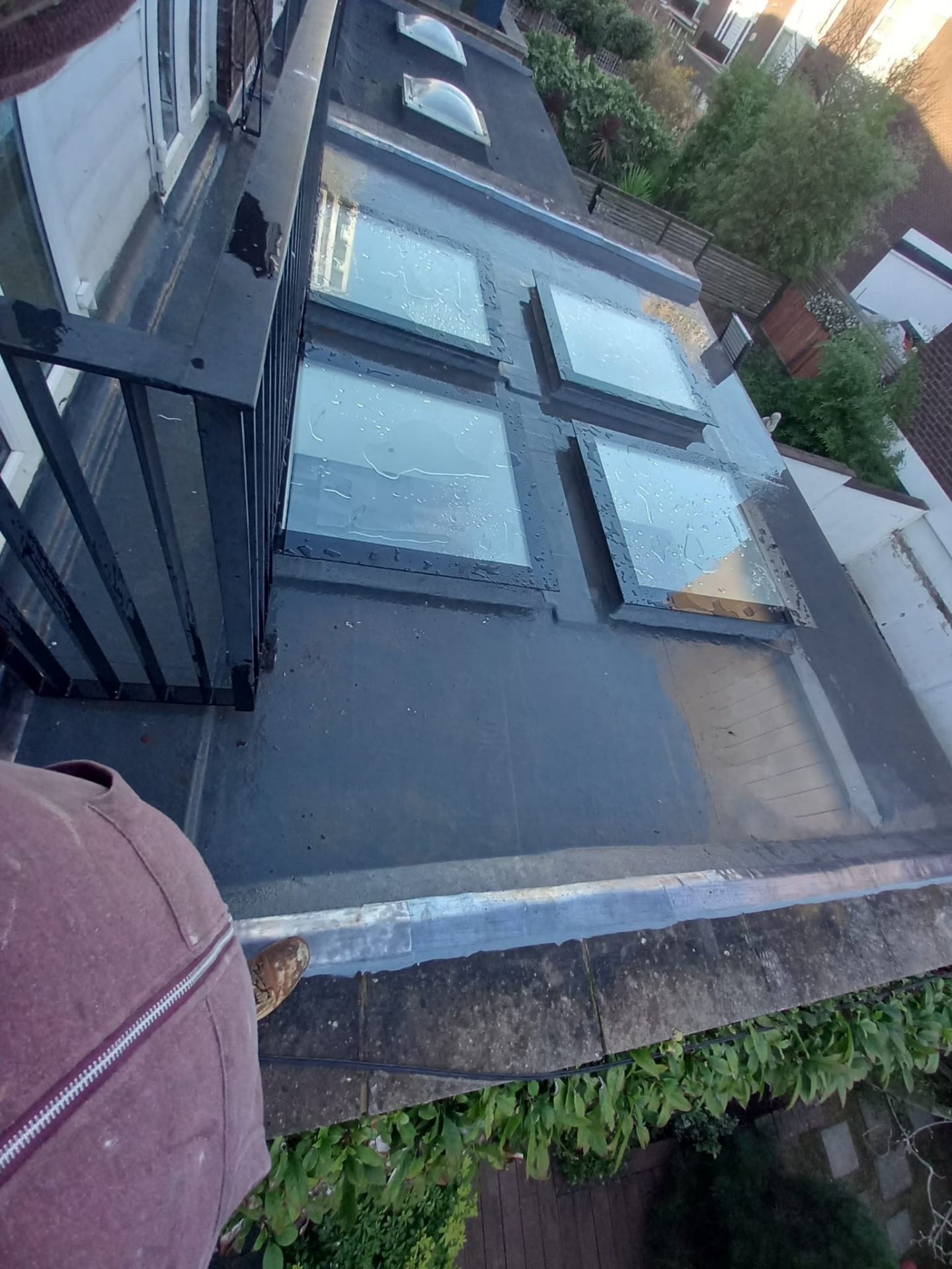 Flat roof with skylights and balcony waterproofing in London