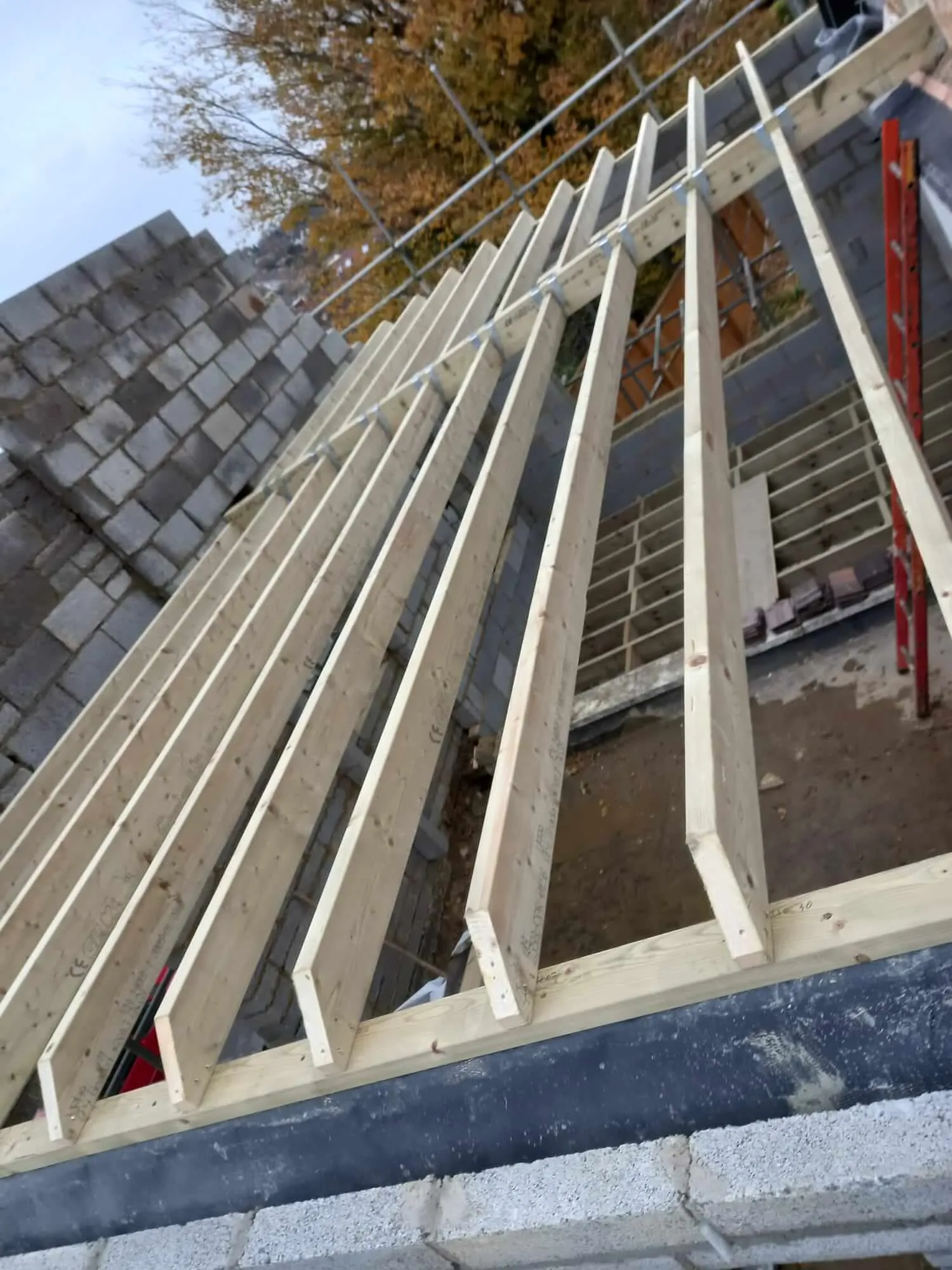Loft conversion rafters and blockwork from exterior during build