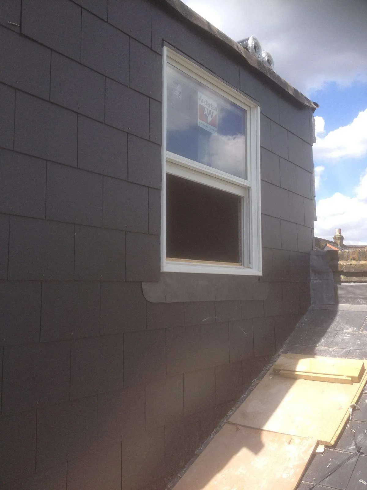 Property with scaffolding for loft conversion work in North London