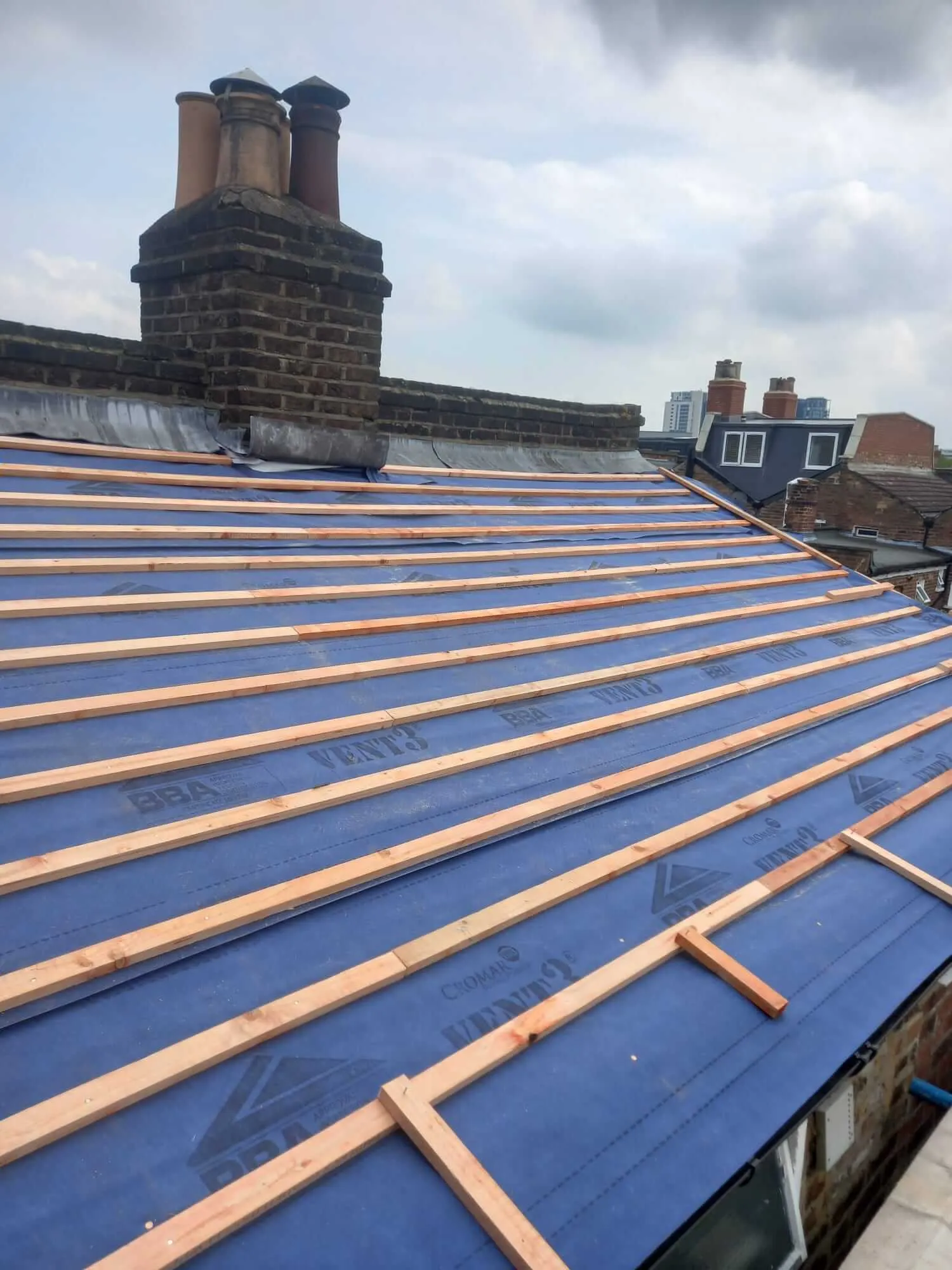 New roof battens and breathable membrane installed during full roof replacement
