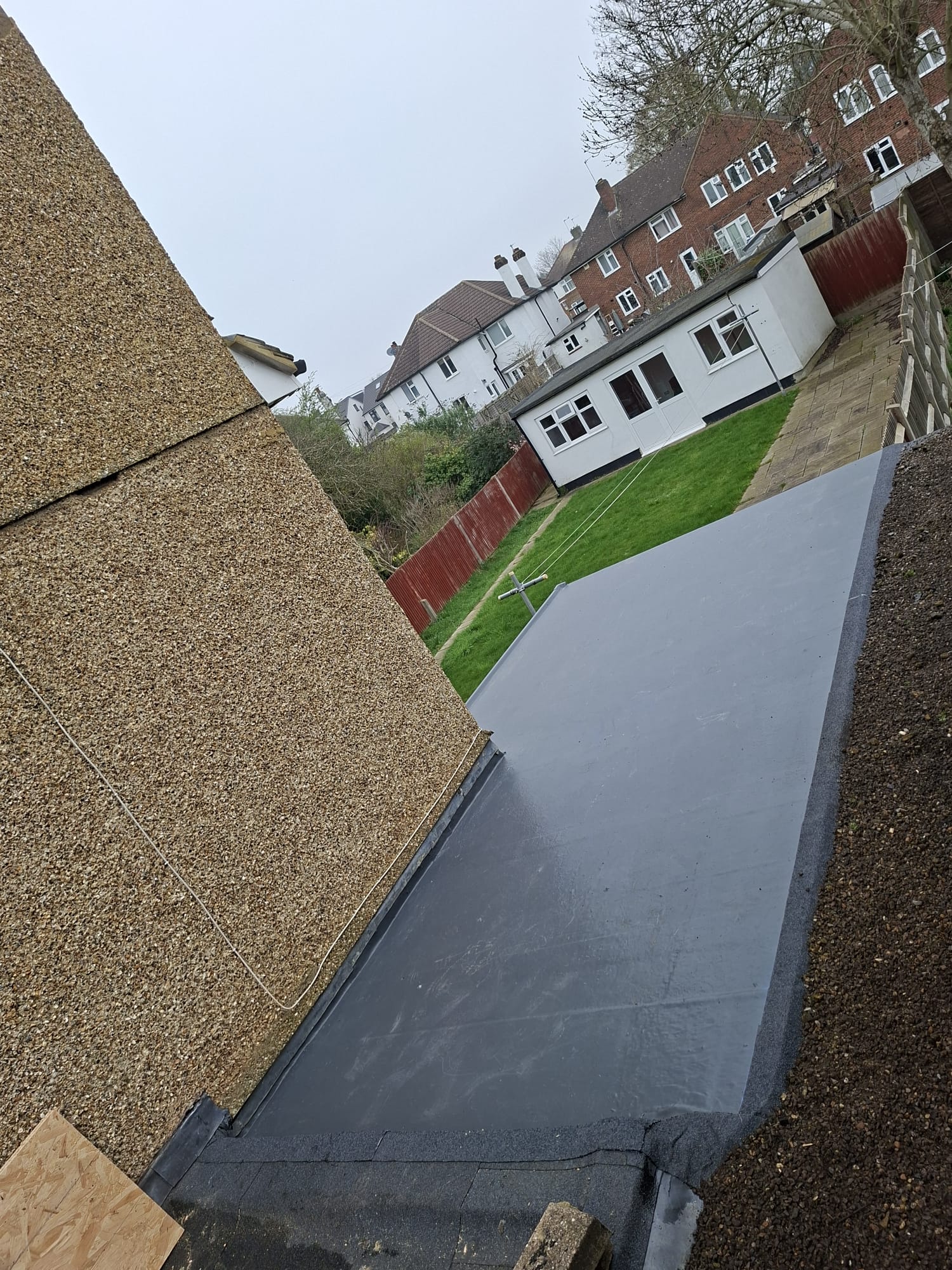 Rubber flat roof on rear extension with garden view