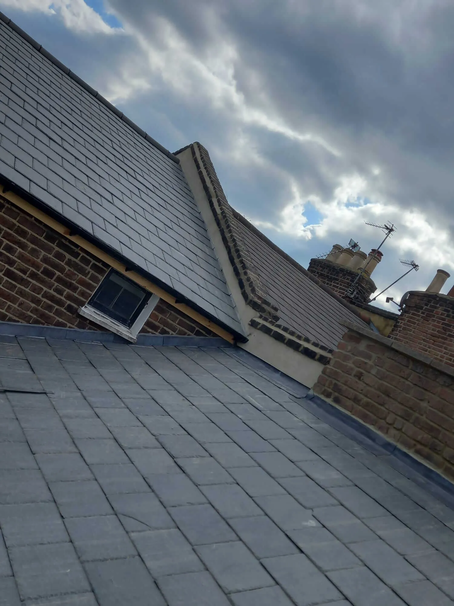 Completed slate roof installation on Victorian property in North London