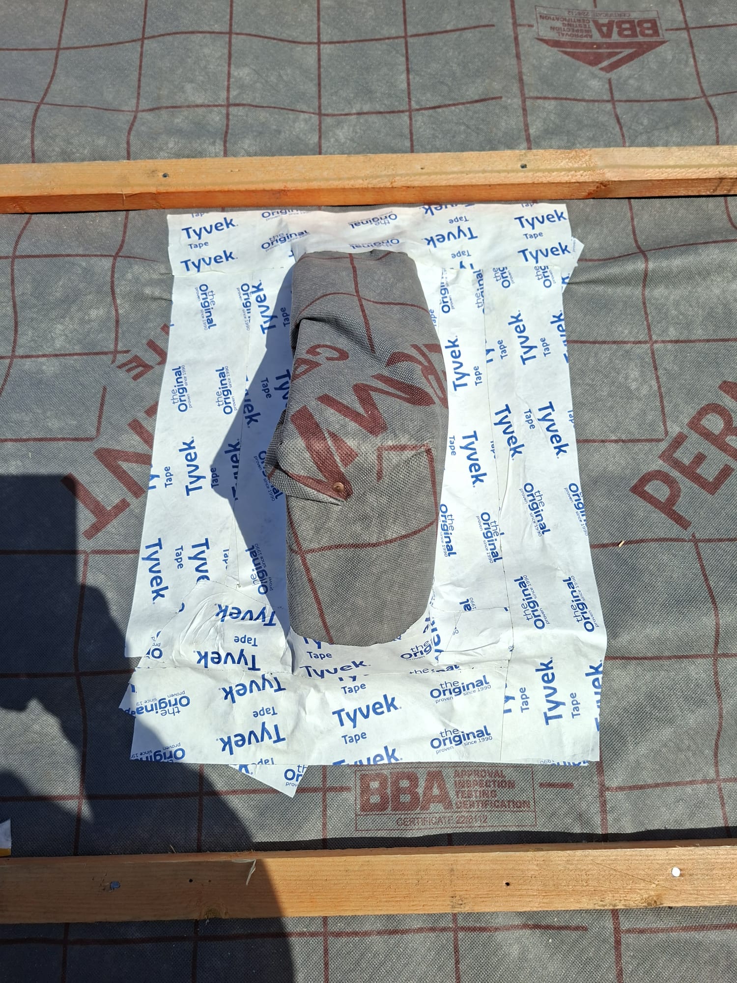 Close-up of Tyvek breathable membrane on roof replacement project